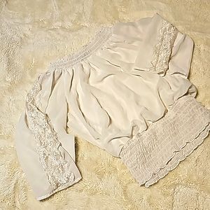 Amy wear sheer white top